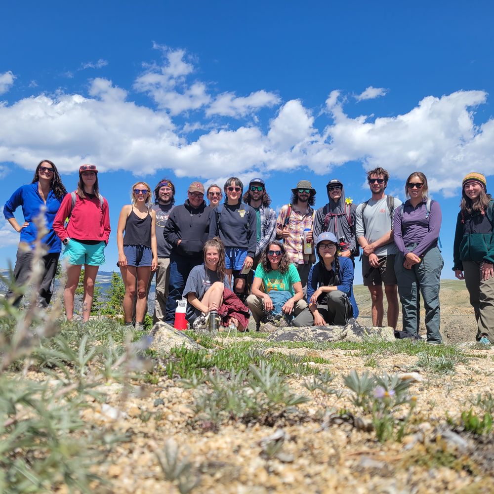 A field course group gathered on an alpine ridge
